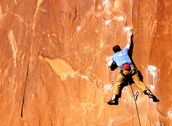 Guy Climbing Rock Wall