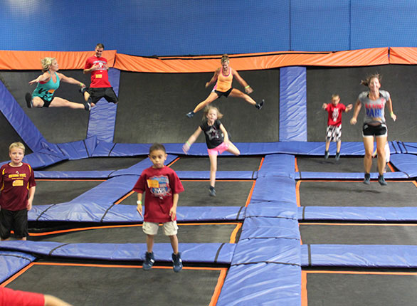 People jumping on trampolines
